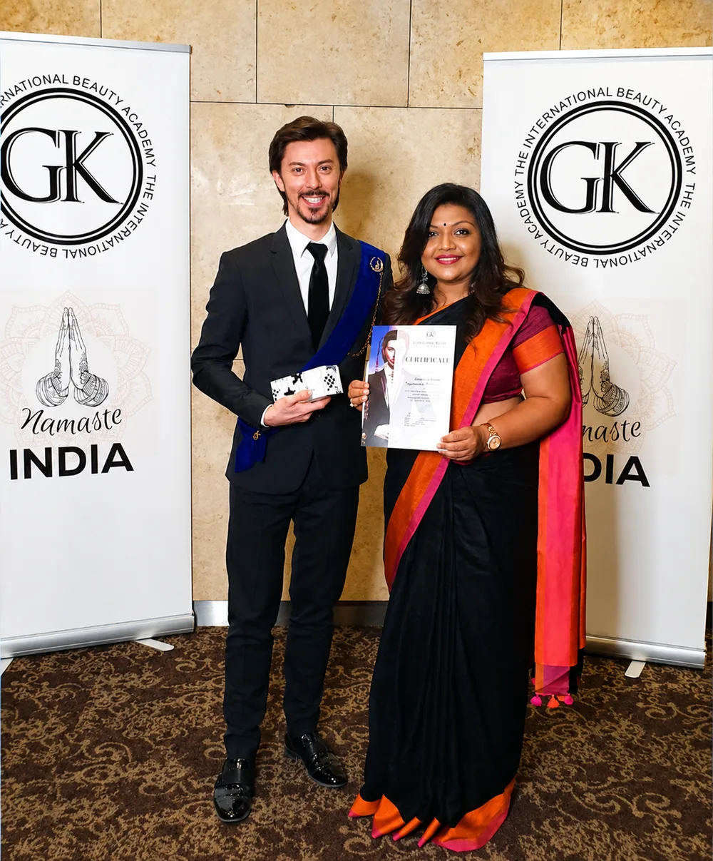 Kausha Shah receiving her certification at the GK International Beauty Academy