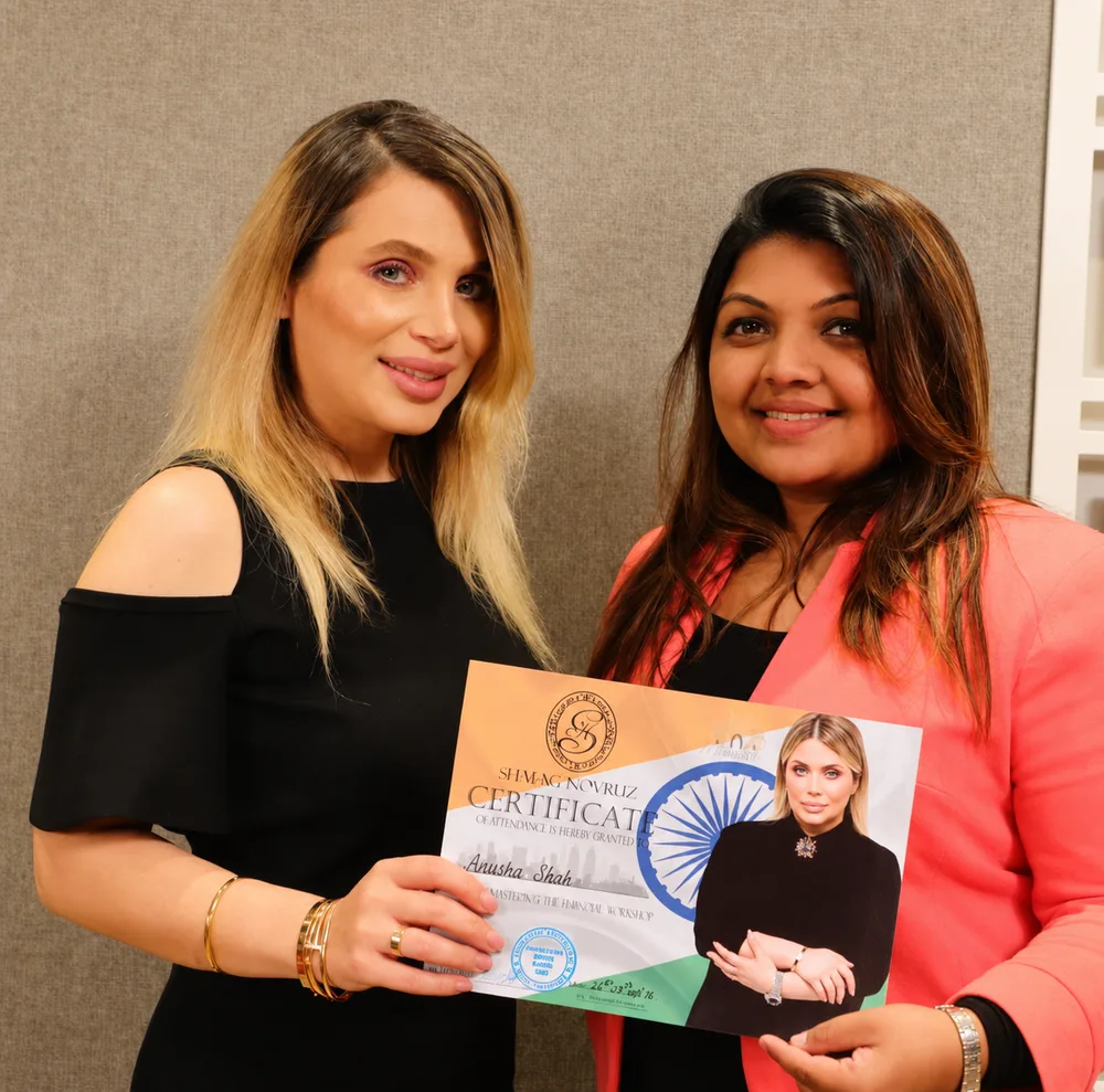 Kausha Shah receiving an international makeup artistry certificate